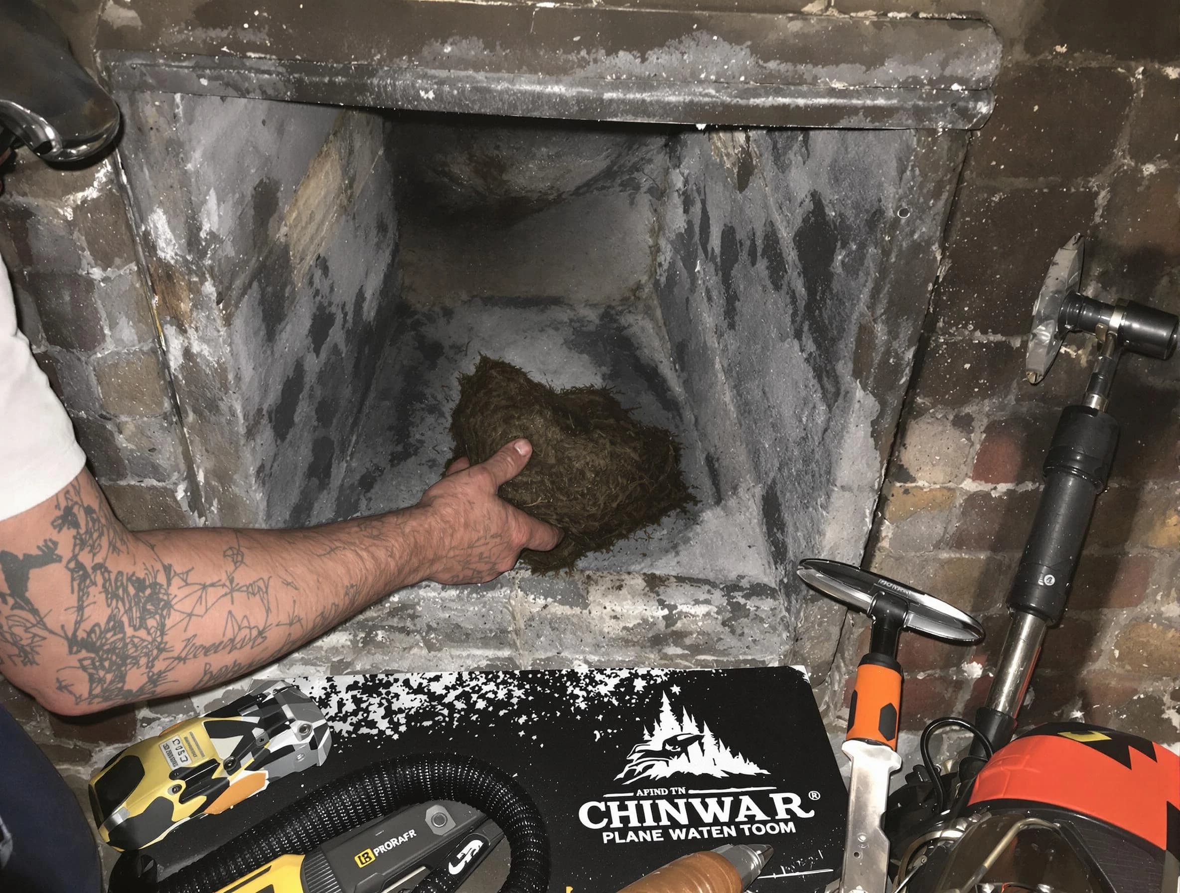 Spencer Chimney Sweep safely removing debris and screening chimney in Spencer, OK